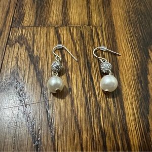 Dangling pearl earrings